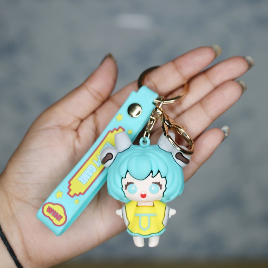 Gifts Wonderland Garden Arts and Craft | Power Girl Cartoon Style Keychain With Band ( Yellow And Green)